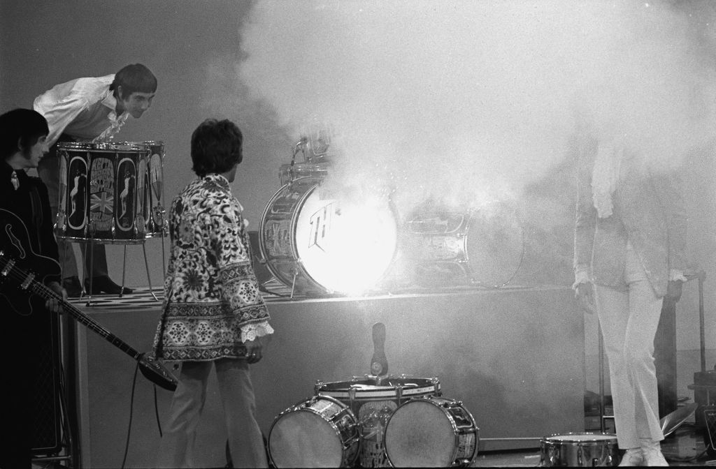 Smoke spreads from drummer Keith Moon’s kit following The Who’s performance on ‘The Smothers Brothers Comedy Hour,’ September 15, 1967. | CBS Photo Archive/Courtesy of Getty Images